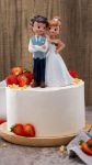Topkagefigur brudepar med blomst 16cm